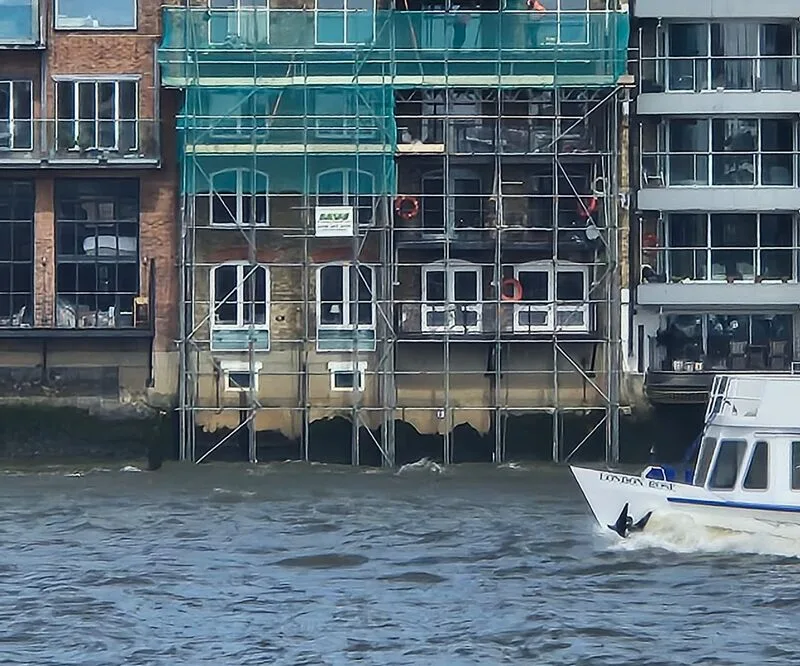 Narrow Street riverside scaffold